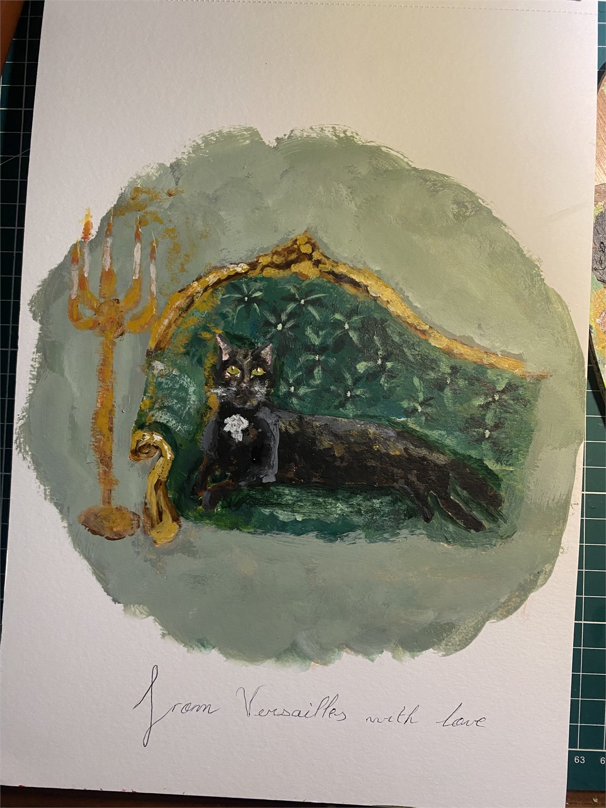 Sarah's painted portrait of a black cat on a green chaise longue